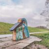 Belevingspad | 8 Afbeelding van een ijsvogel informatiebord naast een belevingspad